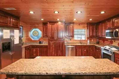 fully equipped kitchen in a smoky mountain cabin